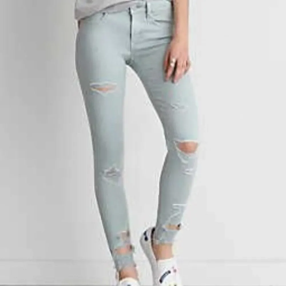 AMERICAN EAGLE Seafoam Destroyed Skinny Jeans